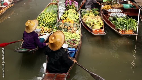 Bangkok. DAMNOEN SADUAK, - JULY 12, 2016: Damnoen Saduak this large and popular floating market is about 100 km southwest of Bangkok in Ratchaburi province , Floating market is famous in Thailand photo