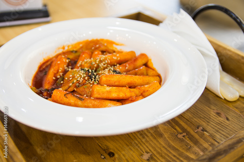 tteokbokki is a famous korean snack that consist of sticky rice, fish cake and gochujang photo