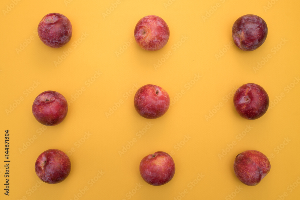 Peaches on a yellow background Peaches on a yellow background
