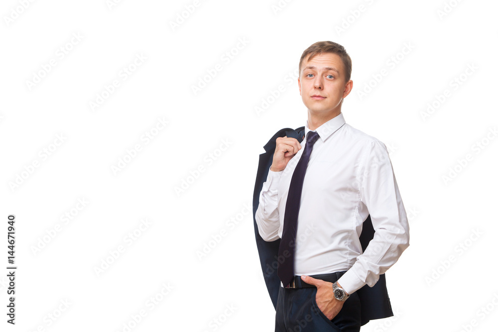 Young handsome businessman is holding a jacket in his one hand and the other hand in his pocket. portrait isolated on white background Young handsome businessman is holding a jacket in his one hand and the other hand in his pocket. portrait isolated on white background