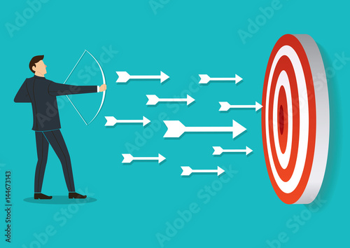 successful businessman aiming target with bow and arrow 