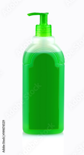 Green bottle with shampoo with dispenser