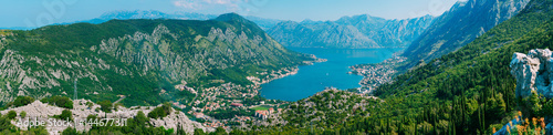 Bay of Kotor from the heights. View from Mount Lovcen to the bay. View down from the observation platform on the mountain Lovcen. Mountains and bay in Montenegro. The liner near the old town of Kotor.