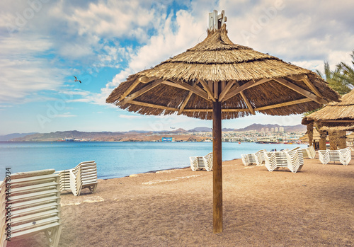 Fototapeta Naklejka Na Ścianę i Meble -  Sandy beach of Eilat - famous resort and recreation city in Israel