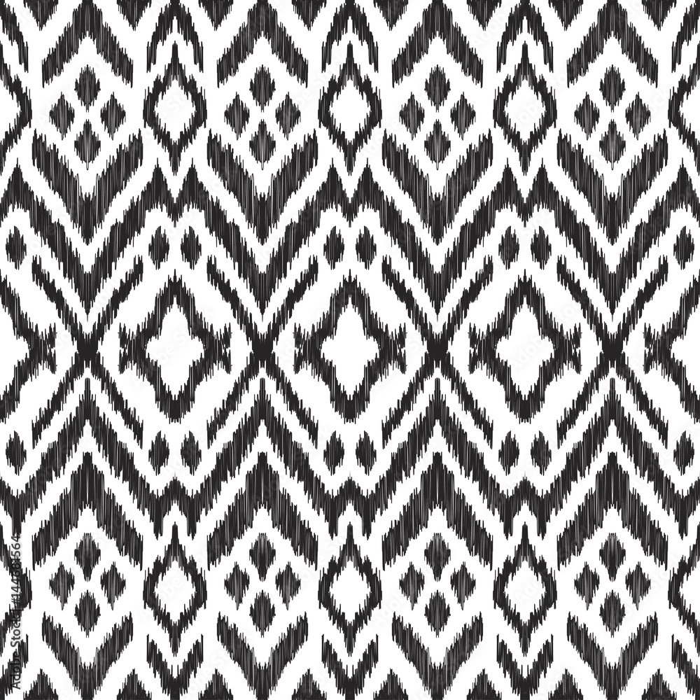 Vector illustration of the black and white colored ikat ornamental seamless pattern. Design in modern ethic style.
