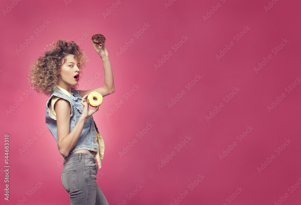 girl dancing with donuts in hand girl dancing with donuts in hand