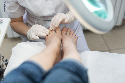 Process pedicure close-up, polishing feet