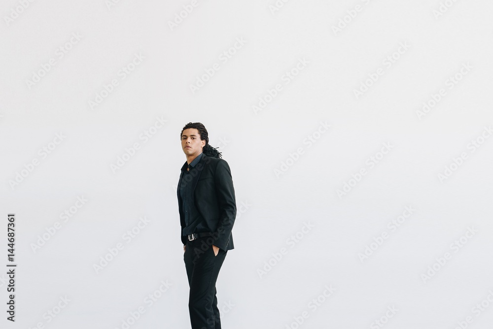 Happy young businessman in black suite Happy young businessman in black suite