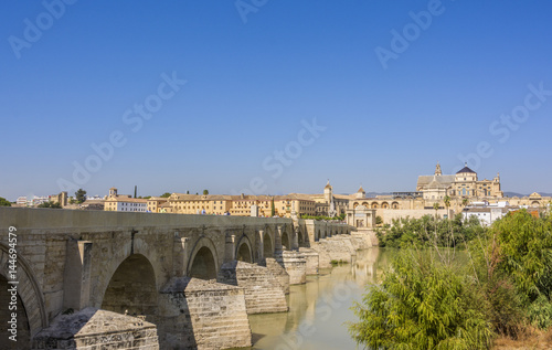 Cordoba, Spain. Famous Roman Bridge and Guadalquivir river. © tanaonte