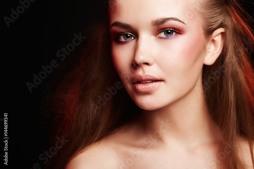 happy woman with make-up and colorful hair