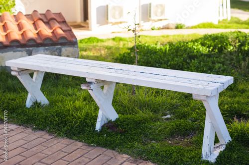 Wooden benches in the city park photo