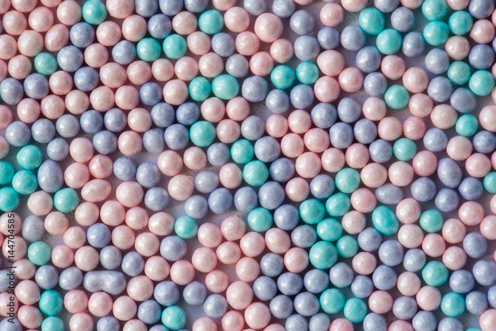 Sugar sprinkle dots, decoration for confectionery. High magnification macro. Sugar sprinkle dots, decoration for confectionery. High magnification macro.