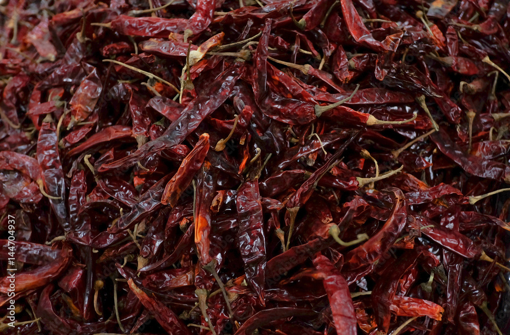 Dried hot pepper. Background and texture of dried hot pepper. Dried hot pepper. Background and texture of dried hot pepper.