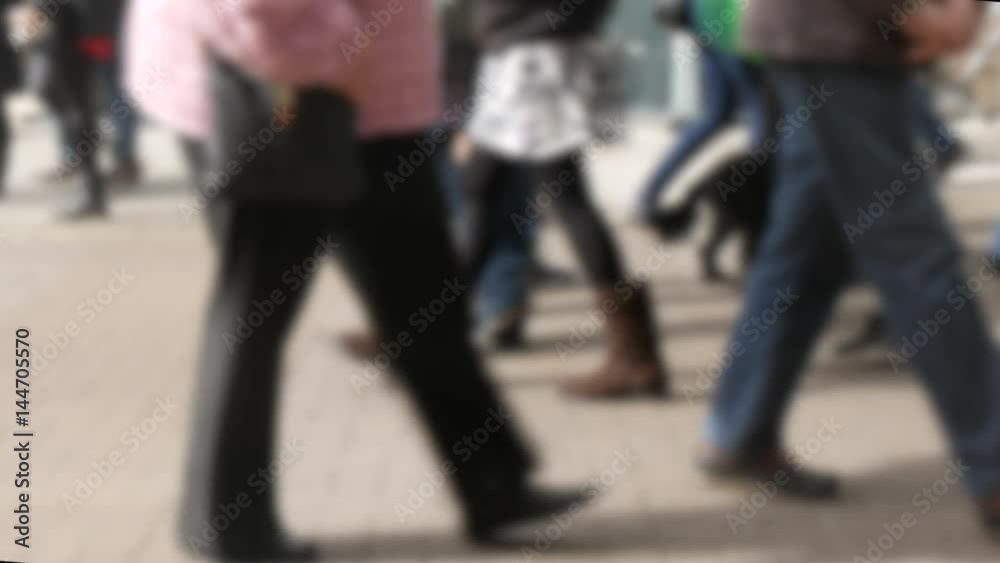Slow motion effect applied to lower half of shoppers body in York city center. Slow motion effect applied to lower half of shoppers body in York city center.