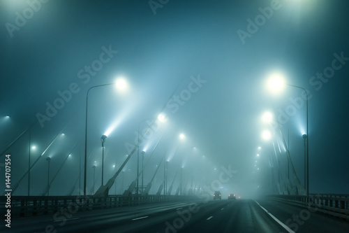 Night Bridge with lights. Cable-stayed bridge. © Grispb