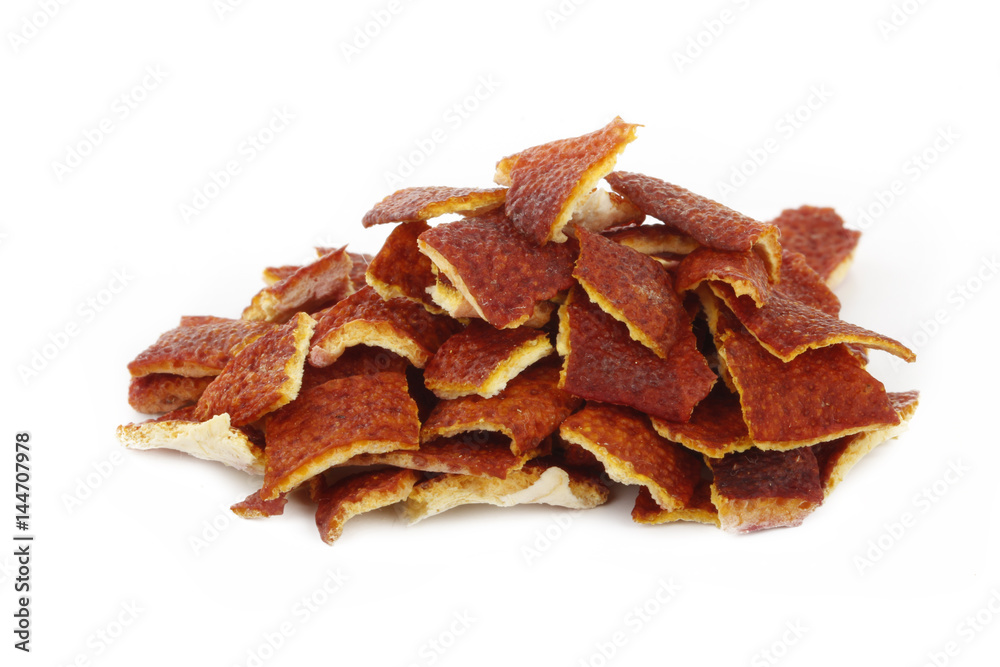 dried rind of red orange isolated