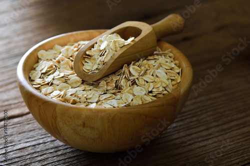 Rolled oats on a wooden table