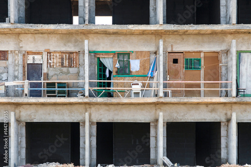 rotten shell of building ocf construction without construction permit photo