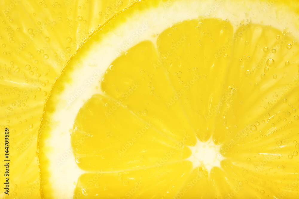 Sliced slices of lemon close-up. Macro.