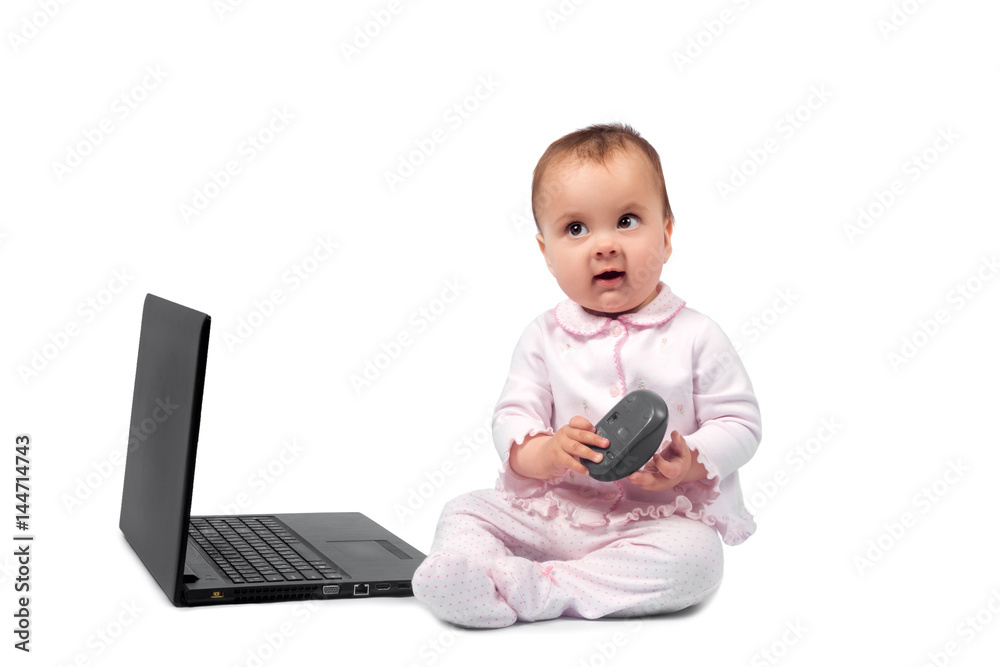 Smiling baby and laptop isolated on white Smiling baby and laptop isolated on white