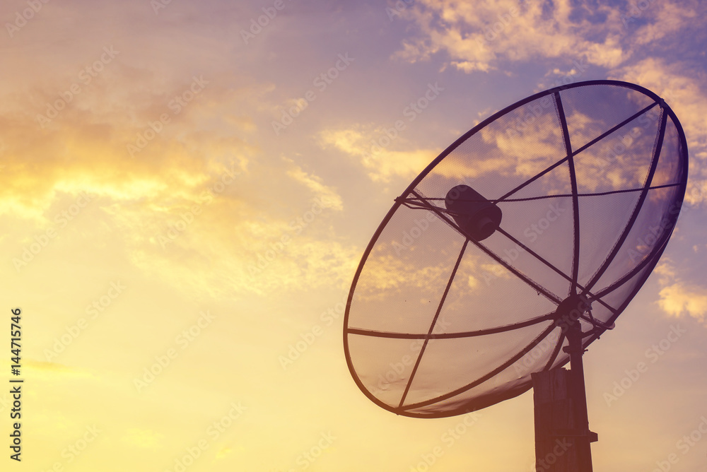 Satellite antenna against with sunset background