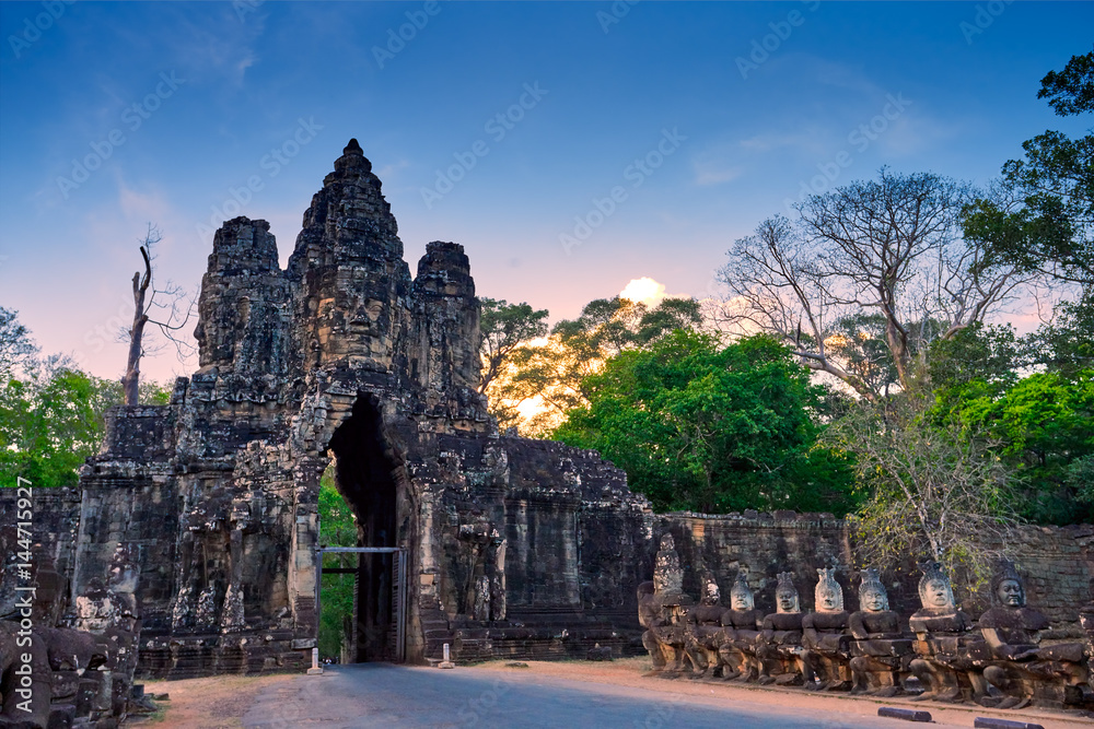 Sunset over South Gate of Angkor Thom in Siem Reap, Cambodia