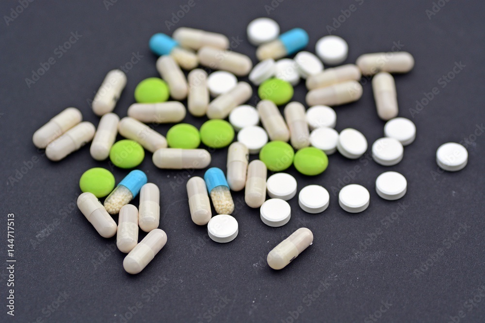 Pills on a black background Pills on a black background