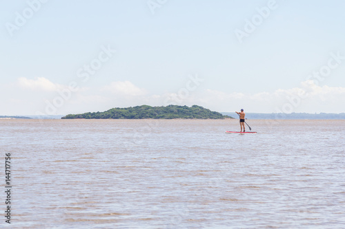 Stand up paddle in Guaiba lake © lisandrotrarbach