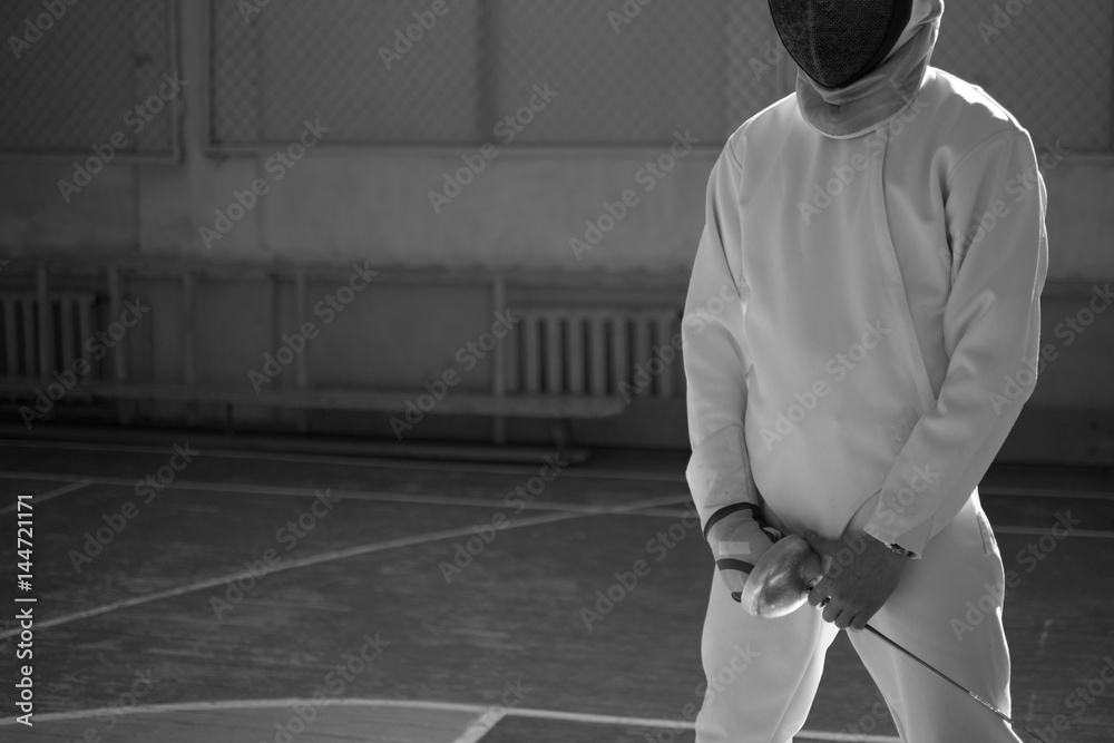 the fencer prepares for competitions. fencing coach. fencing sport