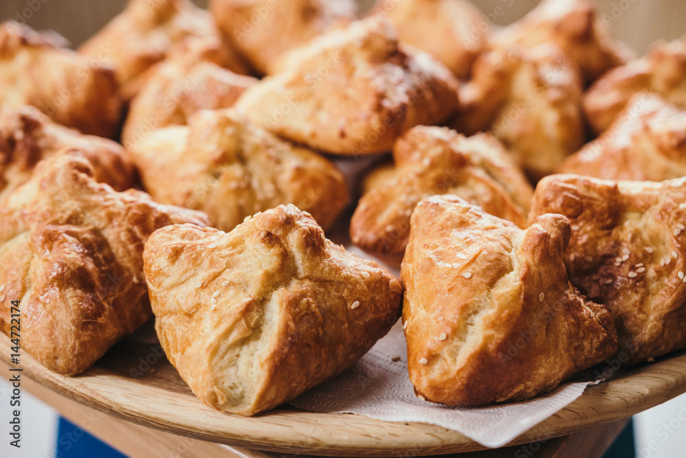 Crispy cheese puff pastries with seeds. Close up Crispy cheese puff pastries with seeds. Close up