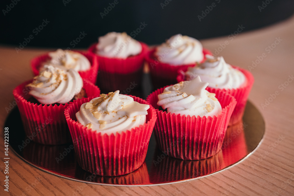 Chocolate cupcake with cream cheese icing with space for text.