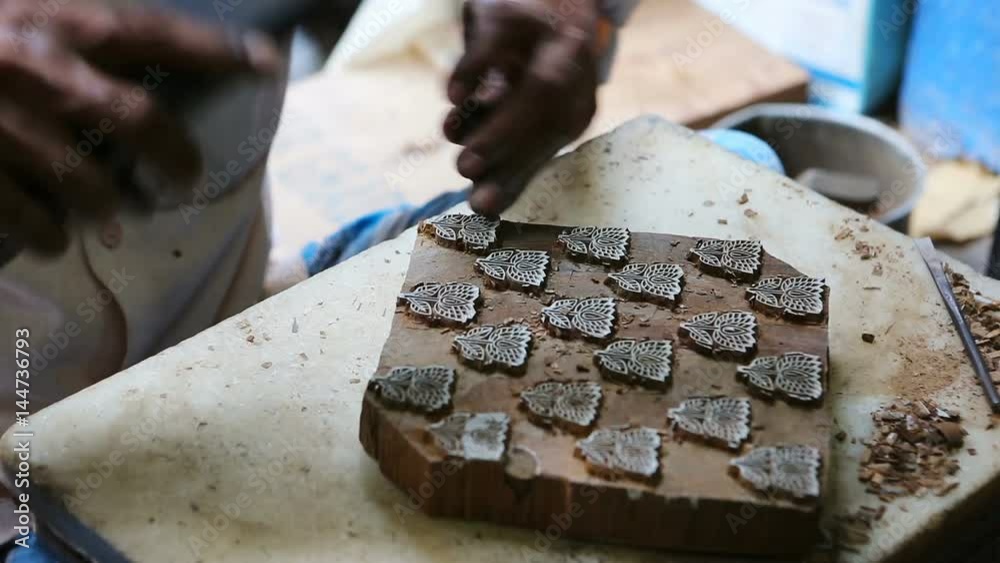 Craftsman making a wooden block for Block Printing for Textile in India. Mumbai, Maharashtra, India.