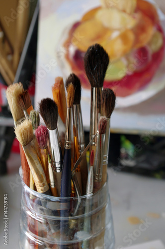 Art painting tools. Round brushes synthetic and squirrel, art hobby.Painting on canvas.Fruit cake painting.