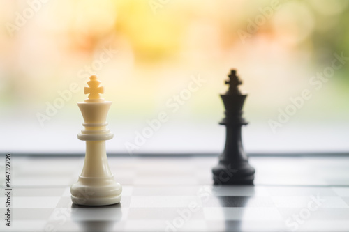 Chess pieces on board, business strategy