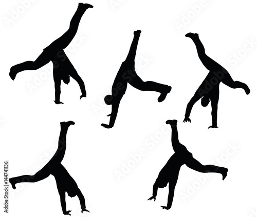 boy silhouette in sitting Cartwheel pose