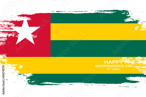 Togo Independence Day celebration card. Brush stroke holiday background. Vector illustration.