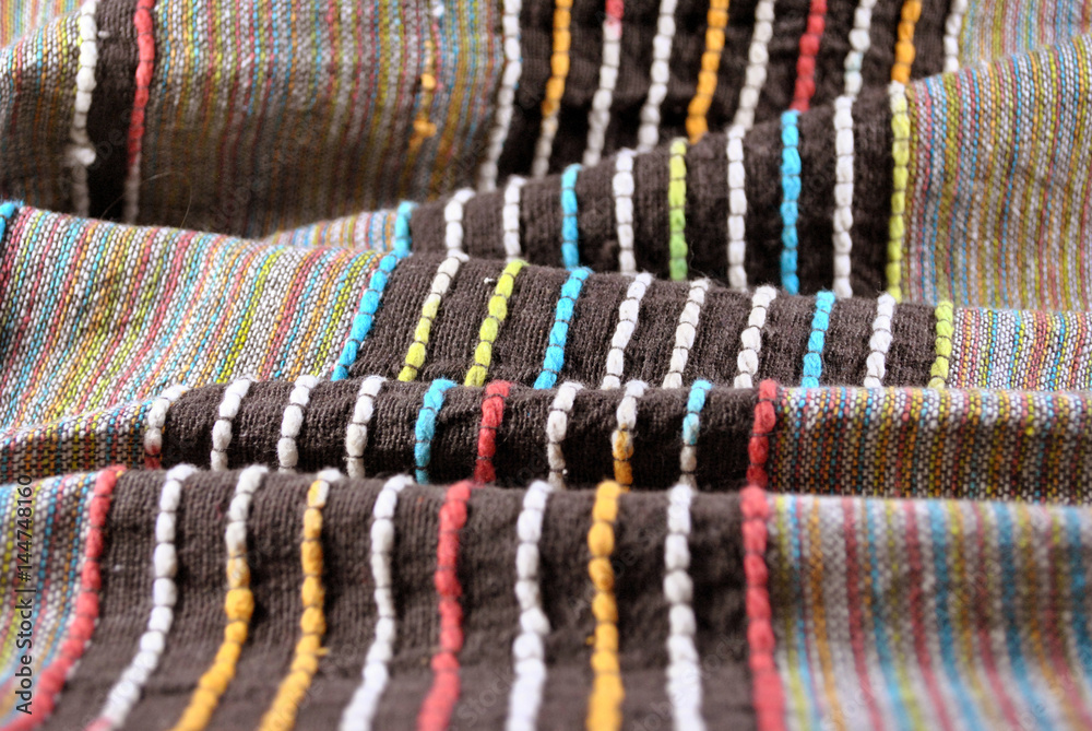 Textile and industry concept - abstract fabric background; close up. Textile and industry concept - abstract fabric background; close up.
