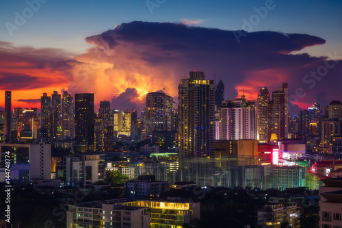 Thunderstorm over Bangkok in Thailand during a colorful sunset . .  © pascalkphoto