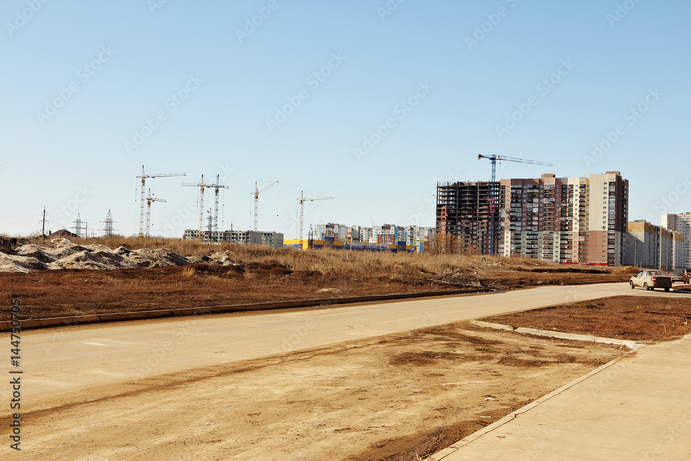 Construction of multi-storey buildings on the outskirts of the city.