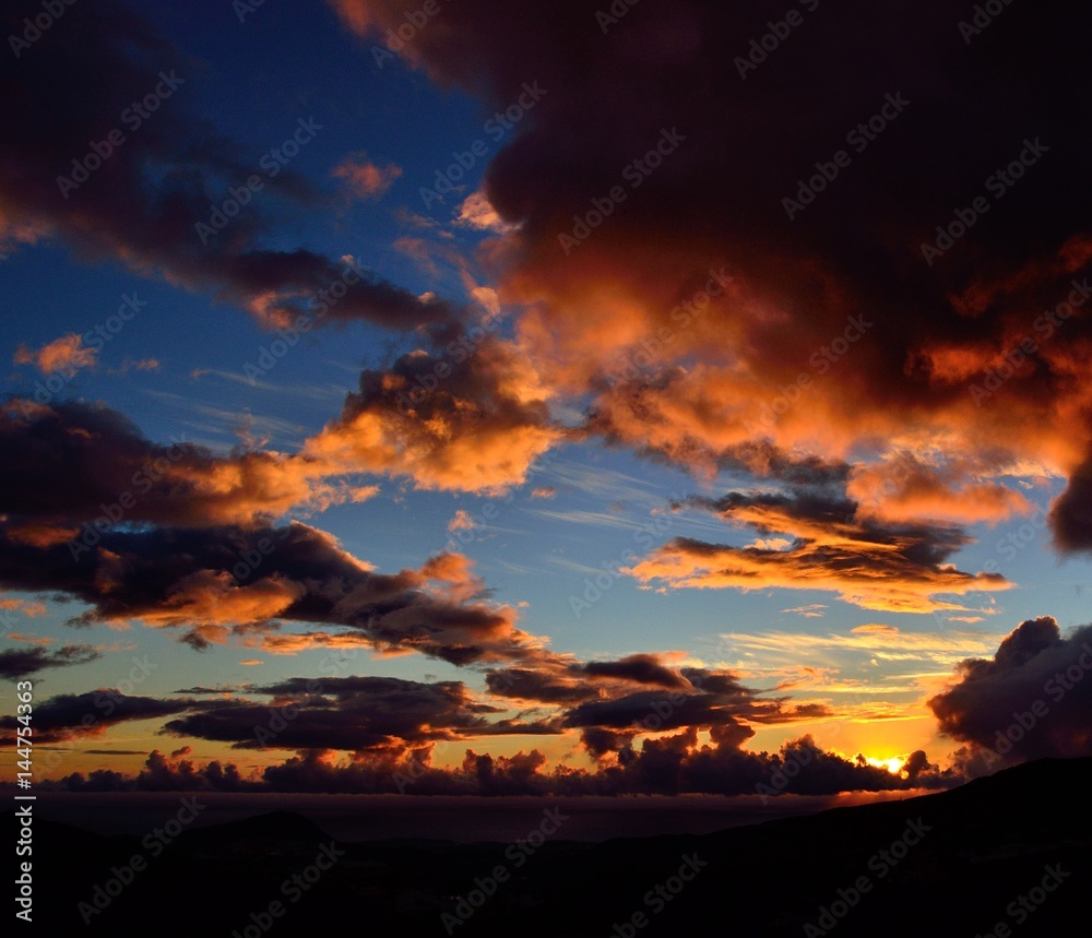 Beautiful dawn with vibrant sky and clouds of color
