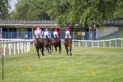 Race horses and jockeys during a race