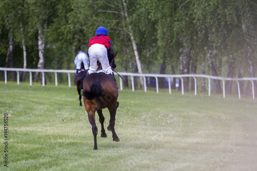 Race horses and jockeys during a race