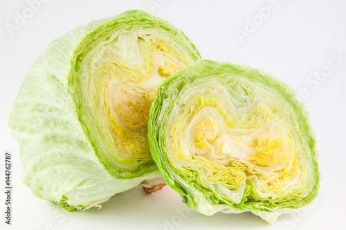 Crisphead lettuce (Lactuca sativa) isolated in white background © anamejia18
