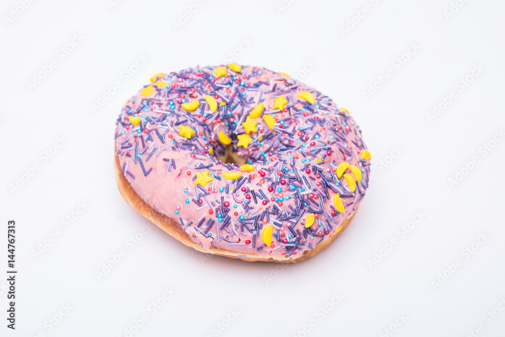 Glazed Donut with sprinkles isolated on white background Glazed Donut with sprinkles isolated on white background