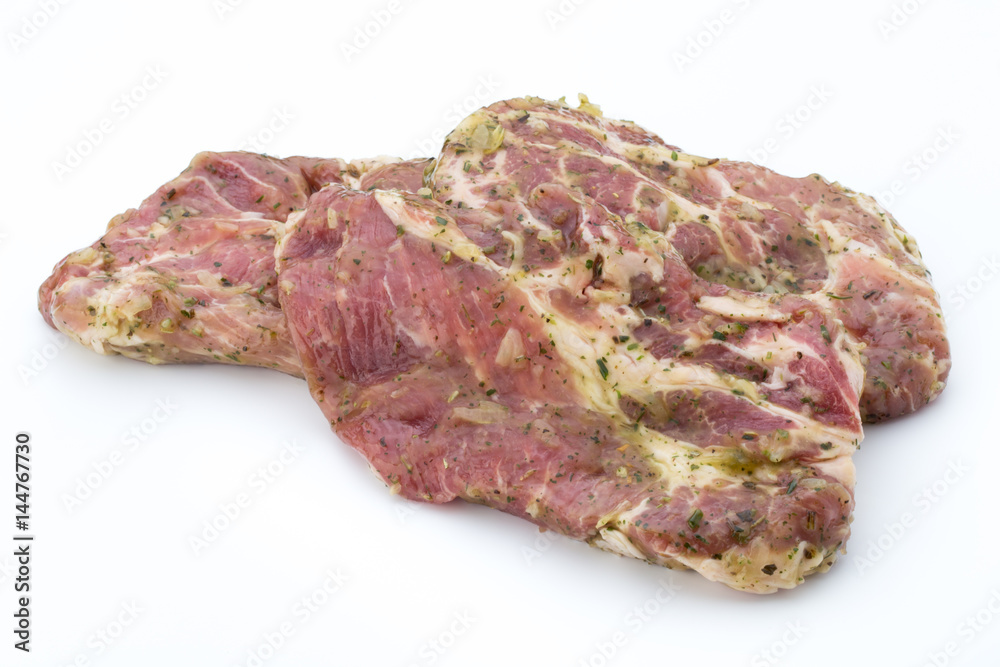 Pork chop, marinated. Isolated on the white background. Pork chop, marinated. Isolated on the white background.