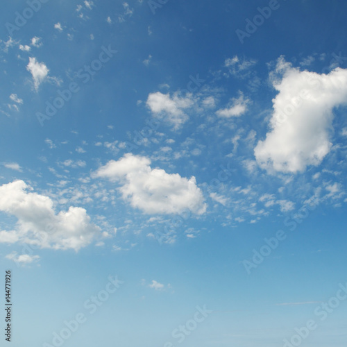 white fluffy clouds on sky