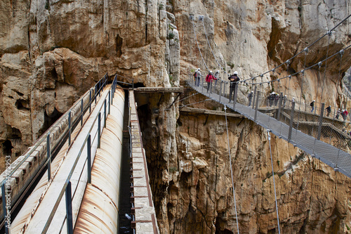 People walking over the suspension bridge of Caminito del Rey, Garganta del Chorro photo