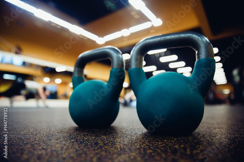 set of weights and a dumbbell for sporting crossfit and fitness in the gym. Sports Equipment.high contrast and monochrome color tone.