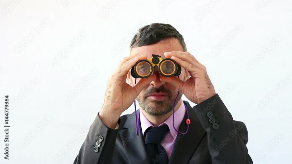 businessman with binocular foresee the future businessman with binocular foresee the future