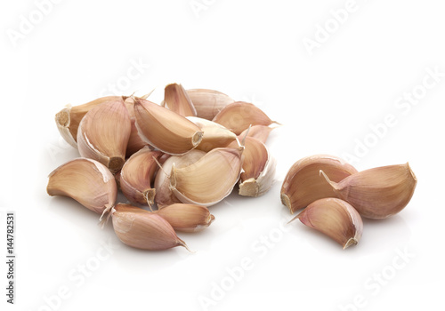 Garlic cloves on a white background. Isolated